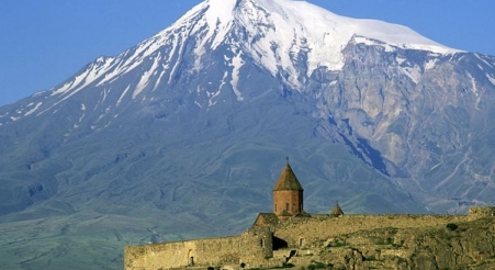 The Khor Virap monastery stands before the snowcapped flanks of Mount Ararat.